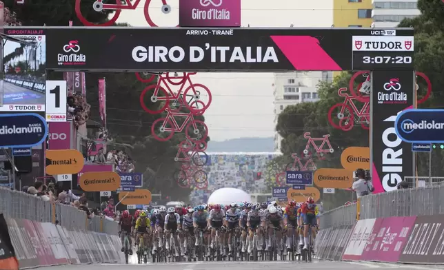 The pack rides during stage 1 of the Giro d'Italia from Durazzo (Durres) to Tirana (Tirane), Albania, Friday, May 9, 2025. (Gian Mattia D'Alberto/LaPresse via AP)