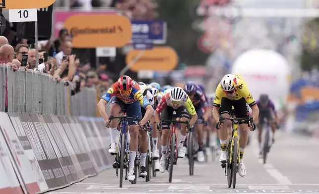 The final sprint of stage 1 of the Giro d'Italia from Durazzo (Durres) to Tirana (Tirane), Albania, Friday, May 9, 2025. (Massimo Paolone/LaPresse via AP)