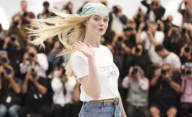 Elle Fanning poses for photographers at the photo call for the film 'Sentimental Value' at the 78th international film festival, Cannes, southern France, Thursday, May 22, 2025. (Photo by Scott A Garfitt/Invision/AP)