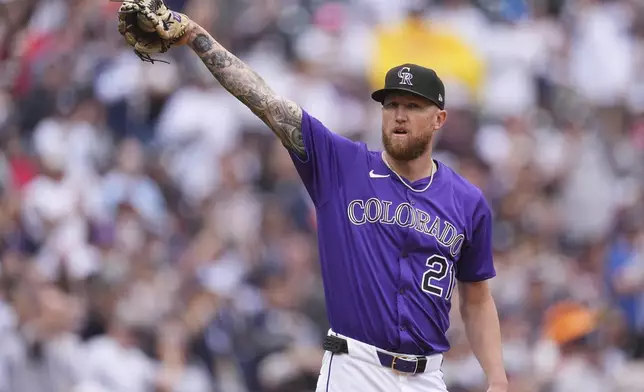 Colorado Rockies starting pitcher Kyle Freeland calls for a new ball after giving up a solo home run to New York Yankees' Aaron Judge in the first inning of a baseball game Saturday, May 24, 2025, in Denver. (AP Photo/David Zalubowski)