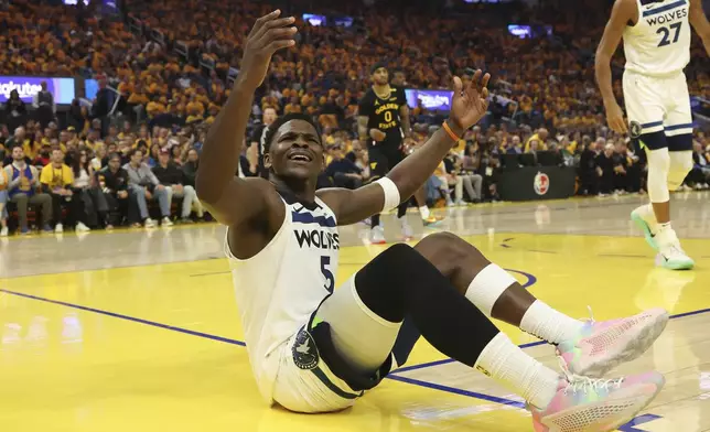 Minnesota Timberwolves guard Anthony Edwards (5) gestures to the referee during the first half of Game 4 in the Western Conference semifinals of the NBA basketball playoffs against the Golden State Warriors, Monday, May 12, 2025, in San Francisco. (AP Photo/Jed Jacobsohn)