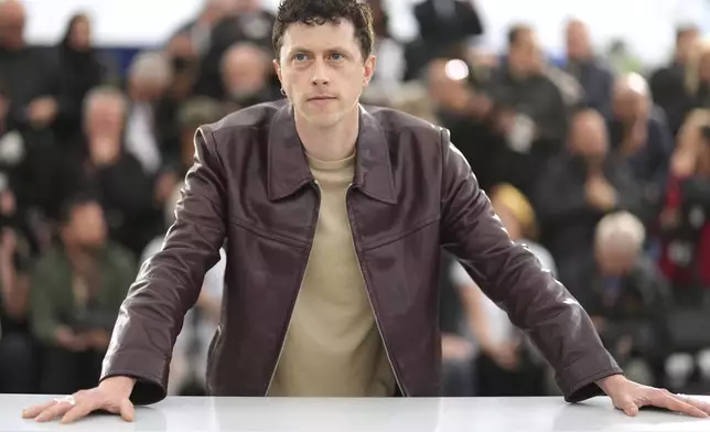 Finnegan Oldfield poses for photographers at the photo call for the film 'Alpha' at the 78th international film festival, Cannes, southern France, Tuesday, May 20, 2025. (AP Photo/Natacha Pisarenko)