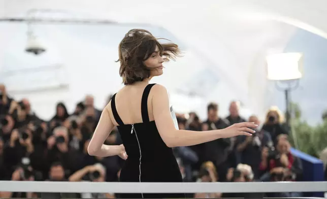 Emma Mackey poses for photographers at the photo call for the film 'Alpha' at the 78th international film festival, Cannes, southern France, Tuesday, May 20, 2025. (AP Photo/Natacha Pisarenko)