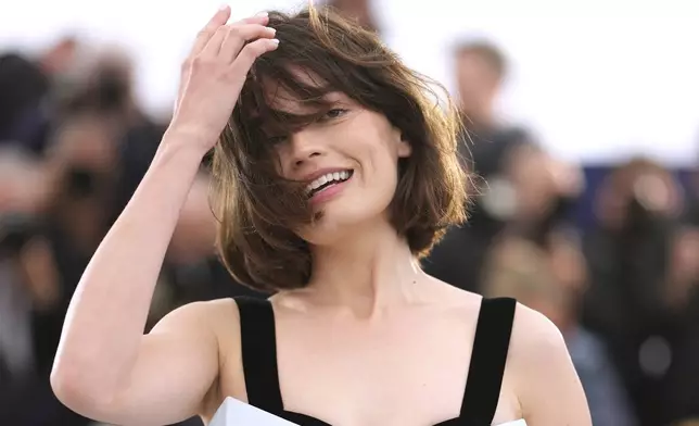 Emma Mackey poses for photographers at the photo call for the film 'Alpha' at the 78th international film festival, Cannes, southern France, Tuesday, May 20, 2025. (AP Photo/Natacha Pisarenko)