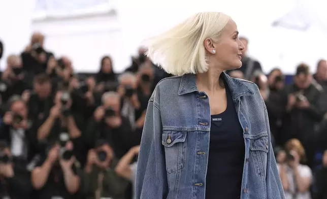 Director Julia Ducournau poses for photographers at the photo call for the film 'Alpha' at the 78th international film festival, Cannes, southern France, Tuesday, May 20, 2025. (AP Photo/Natacha Pisarenko)