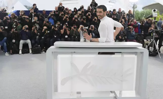 Tahar Rahim poses for photographers at the photo call for the film 'Alpha' at the 78th international film festival, Cannes, southern France, Tuesday, May 20, 2025. (AP Photo/Natacha Pisarenko)
