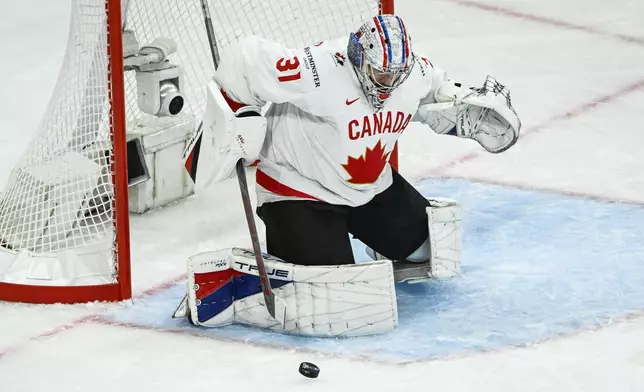 Canada goalkeeper Dylan Garand during the IIHF Ice Hockey World Championship group A match between Slovenia and Canada at Avicii Arena in Stockholm, Sweden, Saturday May 10, 2025. (Fredrik Sandberg/TT News Agency via AP)