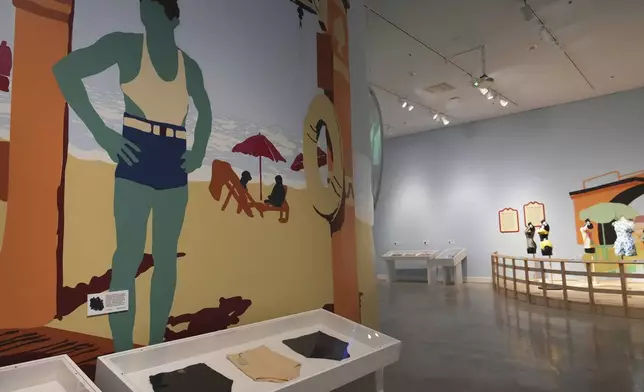 Just in time for bathing suit season, a high-waisted swimsuit for men is shown at the Waves of Style Swimwear Through the Decades exhibit at HistoryMiami Museum Wednesday, May 7, 2025, in advance of opening Saturday in Miami. (AP Photo/Lynne Sladky)