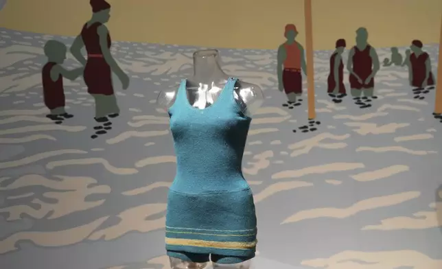 Just in time for bathing suit season, a tank suit made of wool is shown at the Waves of Style Swimwear Through the Decades exhibit at HistoryMiami Museum Wednesday, May 7, 2025, in advance of opening Saturday in Miami. (AP Photo/Lynne Sladky)