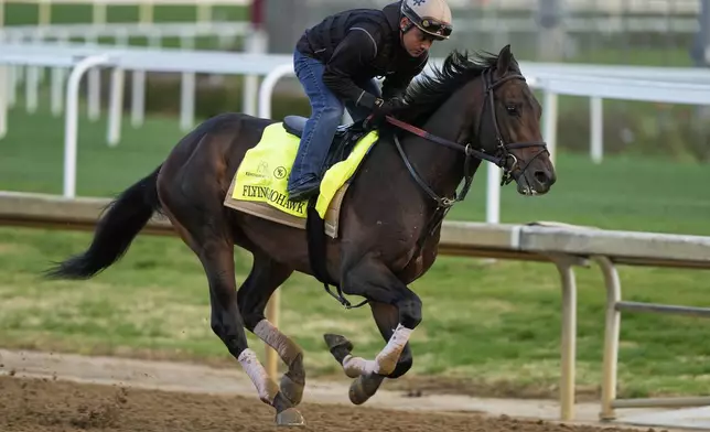 Kentucky Derby entrant Flying Mohawk works out at Churchill Downs Monday, April 28, 2025, in Louisville, Ky. (AP Photo/Charlie Riedel)