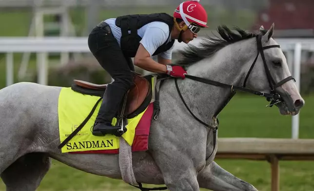 Kentucky Derby entrant Sandman works out at Churchill Downs Tuesday, April 29, 2025, in Louisville, Ky. (AP Photo/Charlie Riedel)