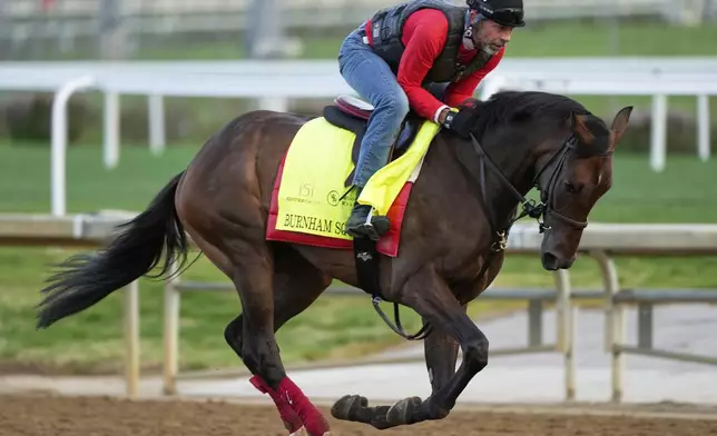 Kentucky Derby entrant Burnham Square works out at Churchill Downs Monday, April 28, 2025, in Louisville, Ky. (AP Photo/Charlie Riedel)