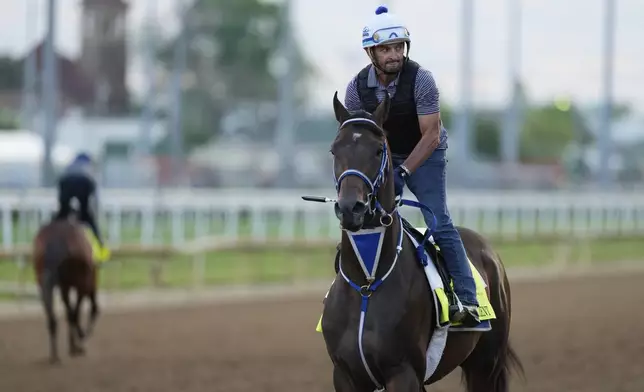 Kentucky Derby entrant Render Judgement works out at Churchill Downs Monday, April 28, 2025, in Louisville, Ky. (AP Photo/Charlie Riedel)