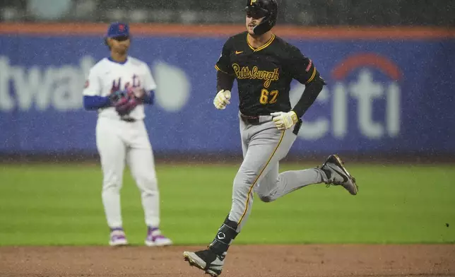 Pittsburgh Pirates' Matt Gorski (62) runs the bases after hitting a two-run home run during the second inning of a baseball game against the New York Mets Wednesday, May 14, 2025, in New York. (AP Photo/Frank Franklin II)