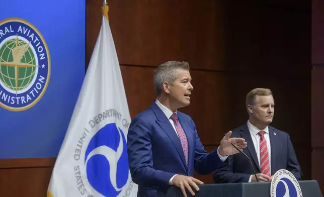 Acting FAA Administrator Chris Rocheleau, right, listens as Secretary of Transportation Sean Duffy speaks during a news conference to provide a status update on Newark Liberty International Airport at the Department of Transportation in Washington, Wednesday, May 28, 2025. (AP Photo/Rod Lamkey, Jr.)