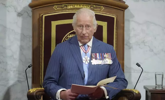King Charles delivers the speech from the throne in the Senate in Ottawa, Canada on Tuesday, May 27, 2025. (Adrian Wyld/The Canadian Press via AP)