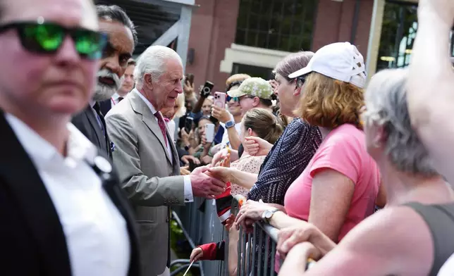 King Charles greets members of the public as he visits a community gathering at Lansdowne Park in Ottawa, Canada, during a royal visit, on Monday, May 26, 2025. (Justin Tang/The Canadian Press via AP)