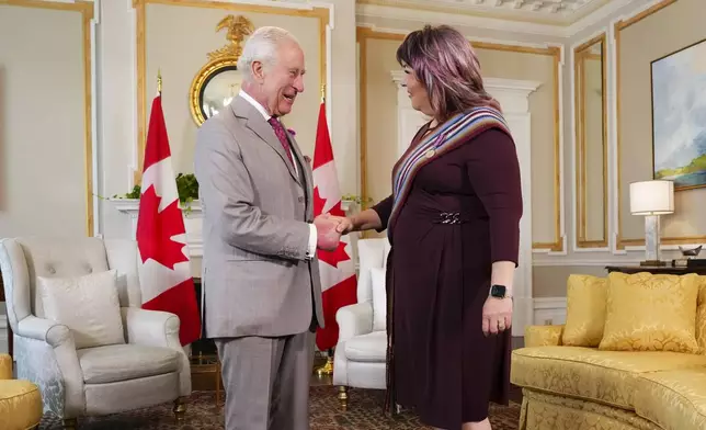 Britain's King Charles, left, meets with Métis National Council President Victoria Pruden at Rideau Hall in Ottawa, Ontario, Monday, May 26, 2025. (Sean Kilpatrick/The Canadian Press via AP)