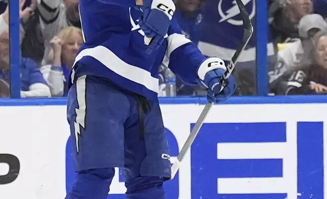 Tampa Bay Lightning left wing Nick Paul (20) celebrates after scoring against the Florida Panthers during the first period in Game 5 of an NHL hockey Stanley Cup first-round playoff series, Wednesday, April 30, 2025, in Tampa, Fla. (AP Photo/Chris O'Meara)