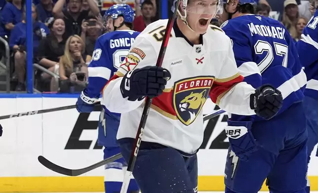 Florida Panthers center Anton Lundell (15) celebrates after scoring against the Tampa Bay Lightning during the first period in Game 5 of an NHL hockey Stanley Cup first-round playoff series, Wednesday, April 30, 2025, in Tampa, Fla. (AP Photo/Chris O'Meara)