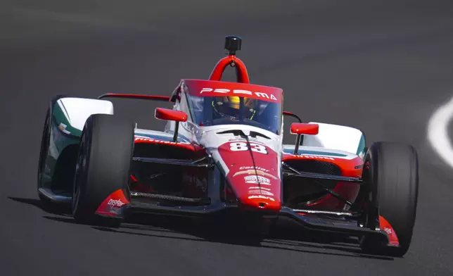 Robert Shwartzman, of Israel, drives through the third turn during qualifications for the Indianapolis 500 auto race at Indianapolis Motor Speedway in Indianapolis, Sunday, May 18, 2025. (AP Photo/Michael Conroy)