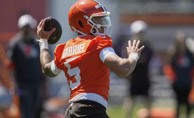 Cleveland Browns quarterback Dillon Gabriel (5) throws during the NFL football team's rookie minicamp in Berea, Ohio, Friday, May 9, 2025. (AP Photo/Sue Ogrocki)