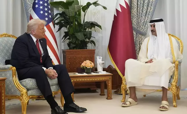 President Donald Trump and Qatar's Emir Sheikh Tamim bin Hamad Al Thani meet at the Amiri Diwan in Doha, Qatar, Wednesday, May 14, 2025. (AP Photo/Alex Brandon)