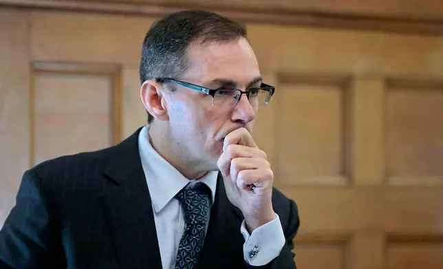 Special prosecutor Hank Brennan questions Sgt. Yuriy Bukhenik, not shown, of the Massachusetts State Police, during the murder retrial of Karen Read in Norfolk Superior Court, Monday, May 12, 2025, in Dedham, Mass. (Pat Greenhouse/The Boston Globe via AP, Pool)