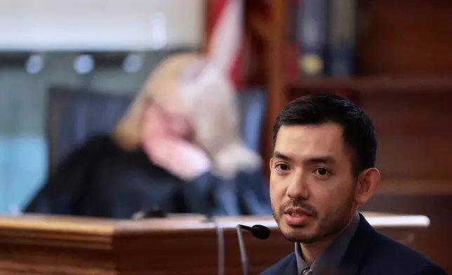 Karl Miyasako, of Bode Technology lab, testifies during the retrial of Karen Read in Norfolk Superior Court, Monday, May 19, 2025, in Dedham, Mass. (Pat Greenhouse/The Boston Globe via AP, Pool)