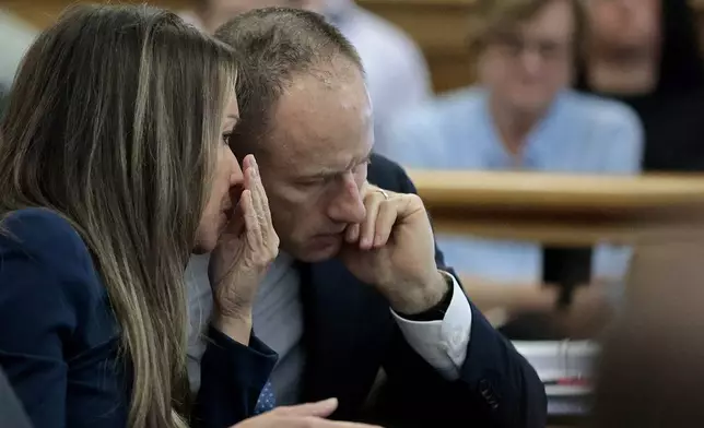 Karen Read confers with defense attorney David Yannetti, during her murder retrial in Norfolk Superior Court, Monday, May 12, 2025, in Dedham, Mass. (Pat Greenhouse/The Boston Globe via AP, Pool)