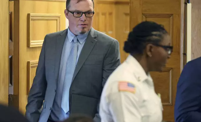 Digital forensics analyst Shanon Burgess walks into court during the Karen Read trial Tuesday, May 20, 2025, in Dedham, Mass. (Matt Stone/The Boston Herald via AP, Pool)