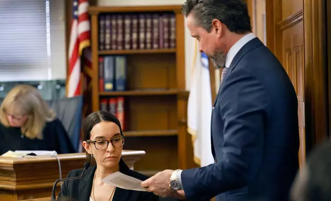 Defense attorney Alan Jackson questions Massachusetts State Police crime lab technician Christina Hanley about fragments of glass and plastic during the Karen Read second murder trail in Norfolk Superior Court, WEdnesday, May 21, 2025, in Dedham, Mass. (Greg Derr/The Patriot Ledger via AP, Pool)