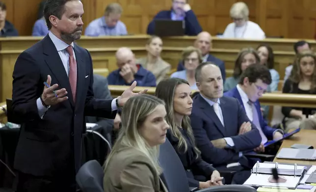 Defense lawyer Alan Jackson, left, questions Massachusetts State Police Sgt. Yuriy Bukhenik during the Karen Read murder trial in Norfolk Superior Court in Dedham, Mass., Friday, May 9, 2025. (Mark Stockwell/The Sun Chronicle via AP, Pool)