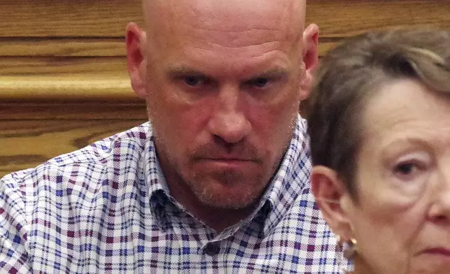 Paul O'Keefe, brother of the decedent John O'Keefe, sits with his family during Karen Read's trial at Norfolk Superior Court in Dedham, Mass., Friday, May 2, 2025. (Mark Jarret Chavous/The Enterprise via AP, Pool)