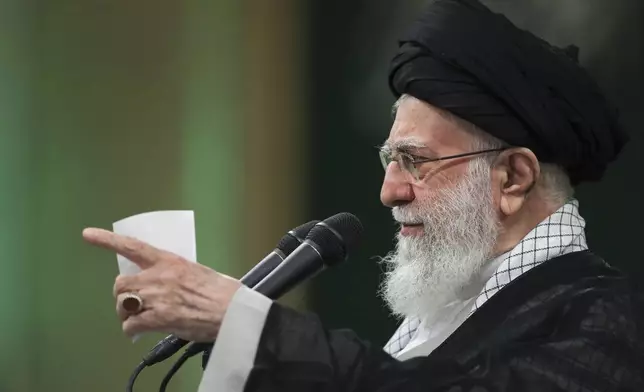 In this photo released by an official website of the office of the Iranian supreme leader, Supreme Leader Ayatollah Ali Khamenei speaks during a meeting with teachers, in Tehran, Iran, Saturday, May 17, 2025. (Office of the Iranian Supreme Leader via AP)