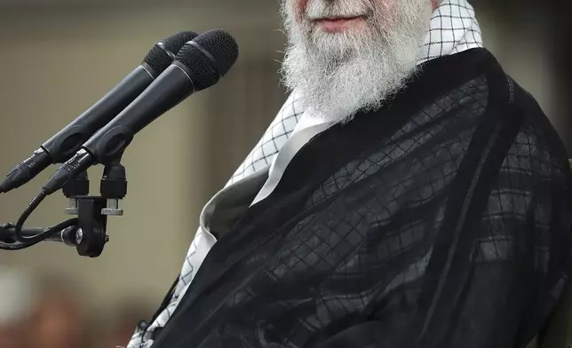 In this photo released by an official website of the office of the Iranian supreme leader, Supreme Leader Ayatollah Ali Khamenei attends a meeting with teachers, in Tehran, Iran, Saturday, May 17, 2025. (Office of the Iranian Supreme Leader via AP)