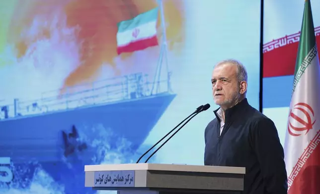 In this photo released by the Iranian Presidency Office, President Masoud Pezeshkian speaks to navy officials, in Tehran, Iran, Saturday, May 17, 2025. (Iranian Presidency Office via AP)