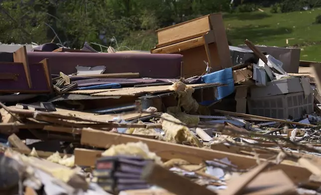 FILE - A piano rests atop what is left of the destroyed Sunshine Hill Baptist Church, May 18, 2025, in London, Ky., after a severe storm passed through the area. (AP Photo/Carolyn Kaster, File)