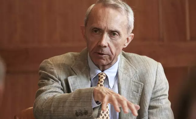 FILE - Retired U.S. Supreme Court Justice David Souter works with his group to promote civics education in New Hampshire schools during a meeting in Concord, N.H., Sept. 16, 2009. (AP Photo/Jim Cole, File)