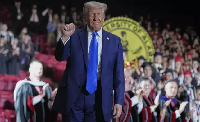 President Donald Trump gestures after giving a commencement address at the University of Alabama, Thursday, May 1, 2025, in Tuscaloosa, Ala. (AP Photo/Manuel Balce Ceneta)