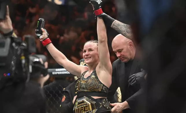 Valentina Shevchenko celebrates her victory over Manon Fiorot following their UFC 315 mixed martial arts flyweight title bout in Montreal, Saturday, May 10, 2025. (Graham Hughes/The Canadian Press via AP)