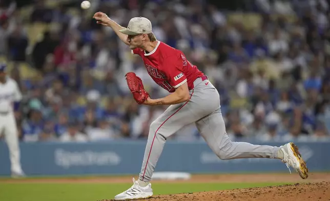 Los Angeles Angels starting pitcher Jack Kochanowicz throws to the plate during the second inning of a baseball game against the Los Angeles Dodgers, Friday, May 16, 2025, in Los Angeles. (AP Photo/Mark J. Terrill)