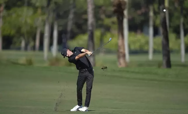 FILE - Luke Clanton hits on the third hole during the final round of the Cognizant Classic golf tournament, Sunday, March 2, 2025, in Palm Beach Gardens, Fla. (AP Photo/Rebecca Blackwell, File)