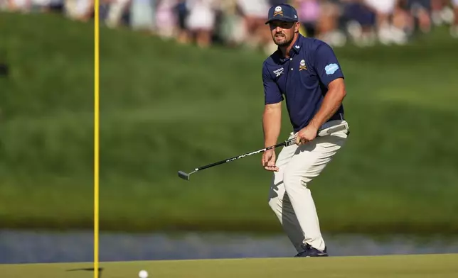 Bryson DeChambeau reacts after missing a putt on the 16th hole during the final round of the PGA Championship golf tournament at the Quail Hollow Club, Sunday, May 18, 2025, in Charlotte, N.C. (AP Photo/Matt York)