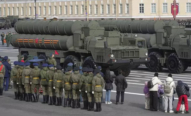 Russian S-400 anti-aircraft missile system launchers roll during a rehearsal for the Victory Day military parade at the Dvortsovaya (Palace) Square in St. Petersburg, Russia, Wednesday, April 30, 2025. (AP Photo/Dmitri Lovetsky)