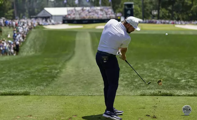 Bryson DeChambeau hits his tee shot on the fourth hole during the third round of the PGA Championship golf tournament at the Quail Hollow Club, Saturday, May 17, 2025, in Charlotte, N.C. (AP Photo/George Walker IV)