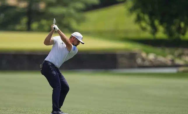 Bryson DeChambeau hits from the fairway on the seventh hole during the third round of the PGA Championship golf tournament at the Quail Hollow Club, Saturday, May 17, 2025, in Charlotte, N.C. (AP Photo/Matt York)