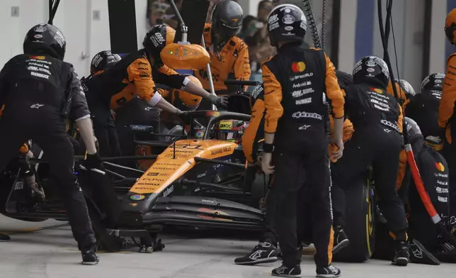 McLaren driver Oscar Piastri of Australia makes a pits stop during the Formula One Miami Grand Prix auto race Sunday, May 4, 2025, in Miami Gardens. Fla. (Shawn Thew/Pool Photo via AP)