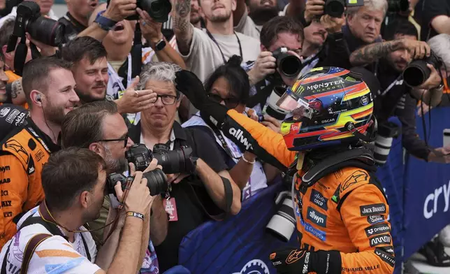 McLaren driver Oscar Piastri of Australia celebrates after winning the Formula One Miami Grand Prix auto race Sunday, May 4, 2025, in Miami Gardens. Fla. (AP Photo/Rebecca Blackwell)