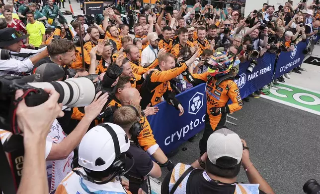 McLaren driver Oscar Piastri of Australia celebrates after winning the Formula One Miami Grand Prix auto race Sunday, May 4, 2025, in Miami Gardens. Fla. (AP Photo/Rebecca Blackwell)